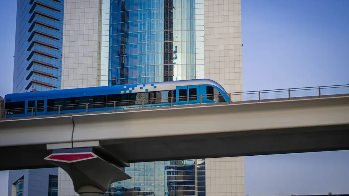 Dubai Metro Red Line train operating along the city transit line Dubai Metro Red Line train operating along the city transit line