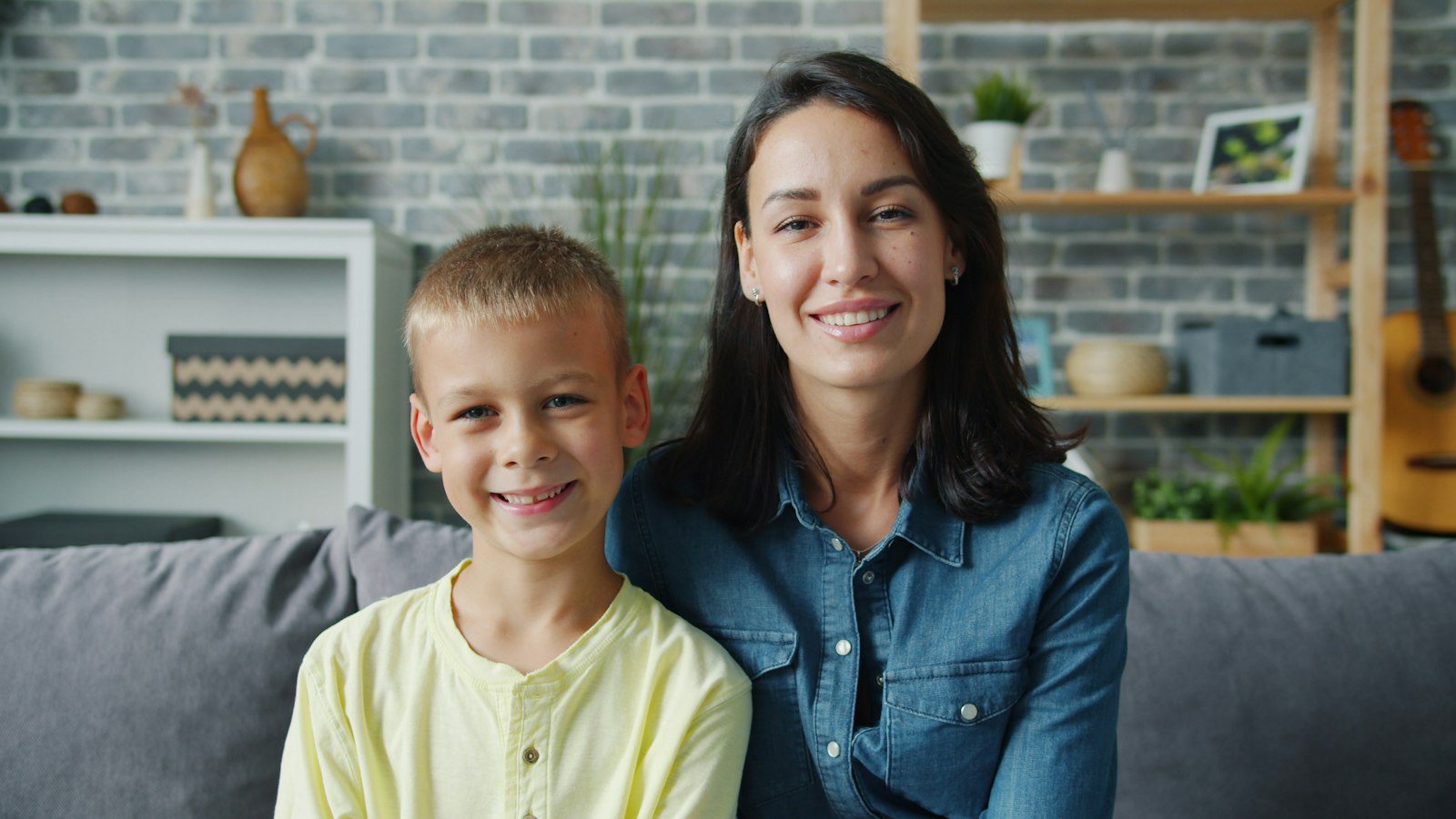 Mother and son at home, illustrating the cost of sponsoring family on a Dubai property visa