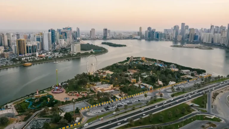 Sharjah waterfront skyline and coastal arrival point for the inter-emirate ferry